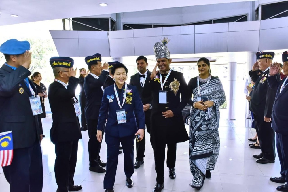 With dignitaries and officials